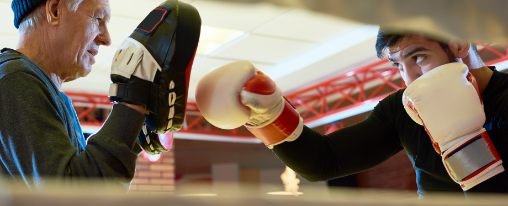 Handpratzen online kaufen bei Kübler Sport Handpratzen für Kampfsporttraining auf weißem Hintergrund, geeignet für Boxen, Kickboxen und MMA