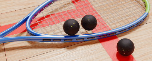 Squashbälle kaufen Drei Squashbälle auf einem Squashschläger