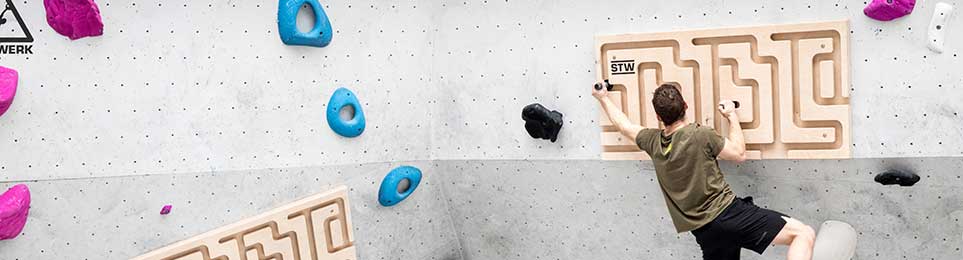 Klettertrainingsgeräte zur Verbesserung von Griffkraft und Körperspannung beim Training in der Kletterhalle oder zu Hause