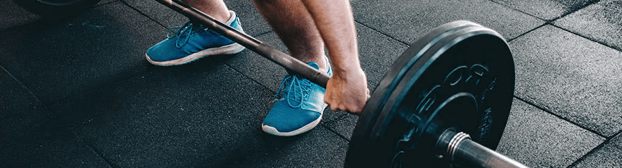 Hochwertiger Stemmboden im Fitnessbereich für sicheres Krafttraining und Gewichtheben