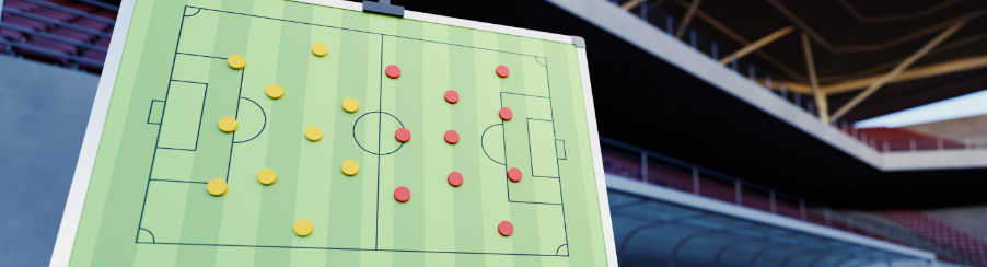 Trainer erläutert mit einer Taktiktafel taktische Spielzüge vor einer Mannschaft im Vereinsheim